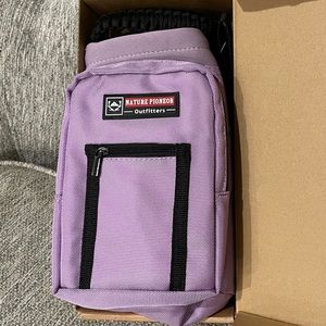 Water bottle and storage carrier/ pouch. Brand New.